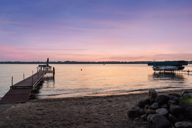 1709 1/2 Pulaski Rd, Buffalo, MN 55313 - dock featuring boat lift and a water view