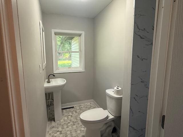 260 Maple St N, Balaton, MN 56115 - bathroom with toilet and baseboards
