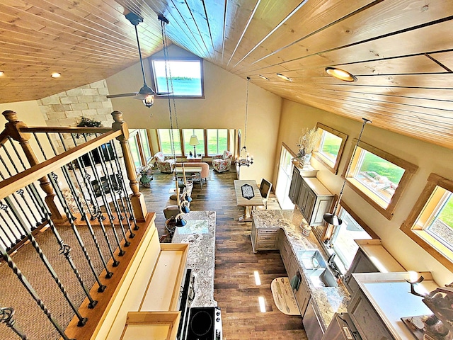 45207 281st Ln, Aitkin, MN 56431 - living area featuring dark wood-type flooring, wooden ceiling, high vaulted ceiling, plenty of natural light, and recessed lighting