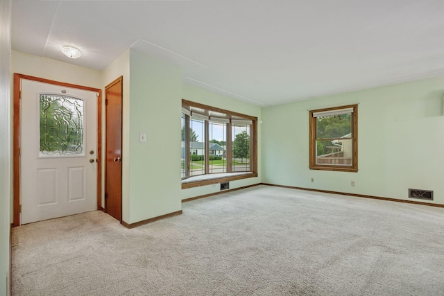 1864 Morgan Ave, Saint Paul, MN 55116 - foyer entrance with carpet flooring and plenty of natural light