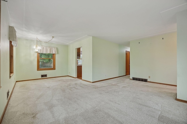 1864 Morgan Ave, Saint Paul, MN 55116 - empty room with light colored carpet and a chandelier