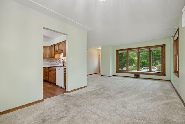 1864 Morgan Ave, Saint Paul, MN 55116 - unfurnished living room with carpet and baseboards