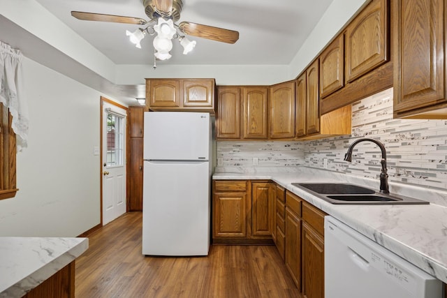 1864 Morgan Ave, Saint Paul, MN 55116 - kitchen featuring white appliances, wood finished floors, and decorative backsplash