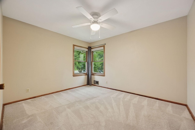 1864 Morgan Ave, Saint Paul, MN 55116 - unfurnished room with light colored carpet and a ceiling fan