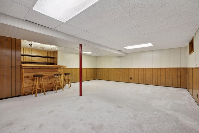 1864 Morgan Ave, Saint Paul, MN 55116 - finished basement featuring wood walls, a dry bar, carpet, wainscoting, and a paneled ceiling