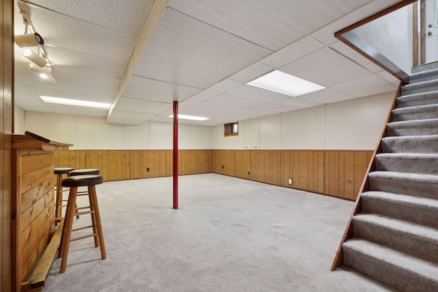 1864 Morgan Ave, Saint Paul, MN 55116 - finished basement with stairway, carpet flooring, wooden walls, wainscoting, and a drop ceiling