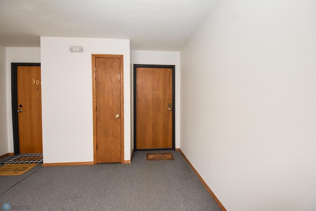 2515 25th St S Unit 303H, Fargo, ND 58103 - spare room featuring baseboards and carpet