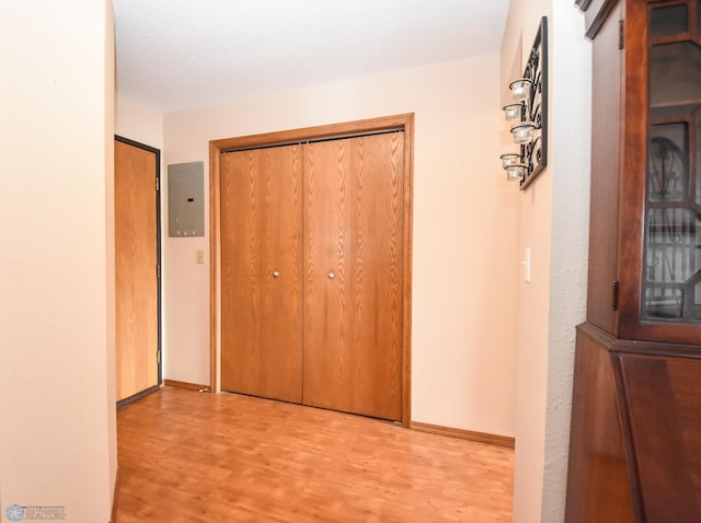 2515 25th St S Unit 303H, Fargo, ND 58103 - hall with electric panel and wood finished floors