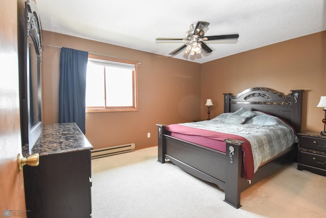 2515 25th St S Unit 303H, Fargo, ND 58103 - carpeted bedroom with a baseboard heating unit and a ceiling fan