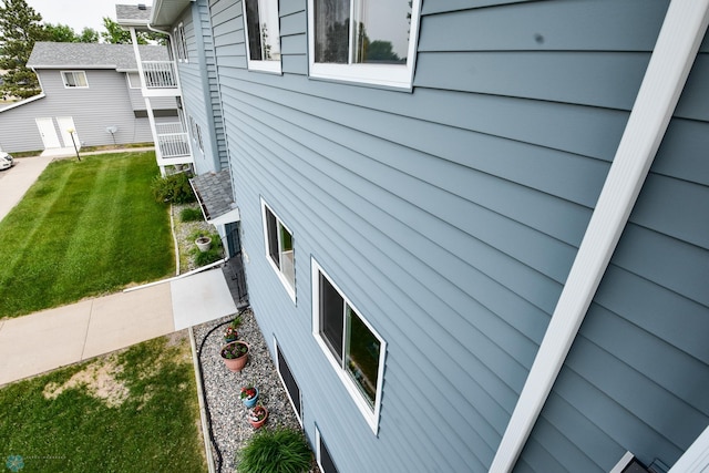 2515 25th St S Unit 303H, Fargo, ND 58103 - view of home's exterior featuring a yard