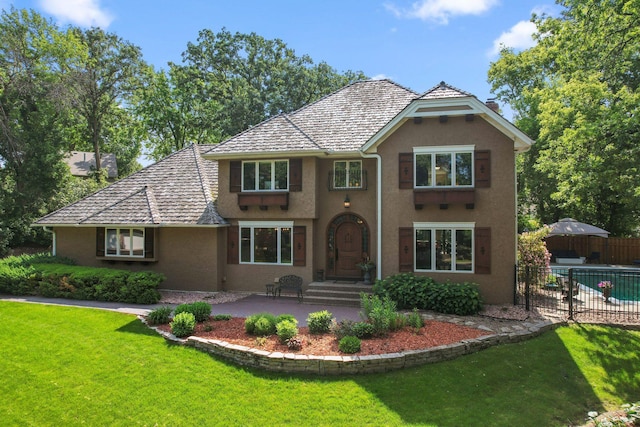 16209 Adeline Ln, Minnetonka, MN 55391 - view of front of home featuring stucco siding and a patio