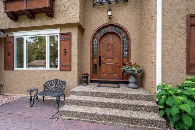 16209 Adeline Ln, Minnetonka, MN 55391 - doorway to property featuring stucco siding