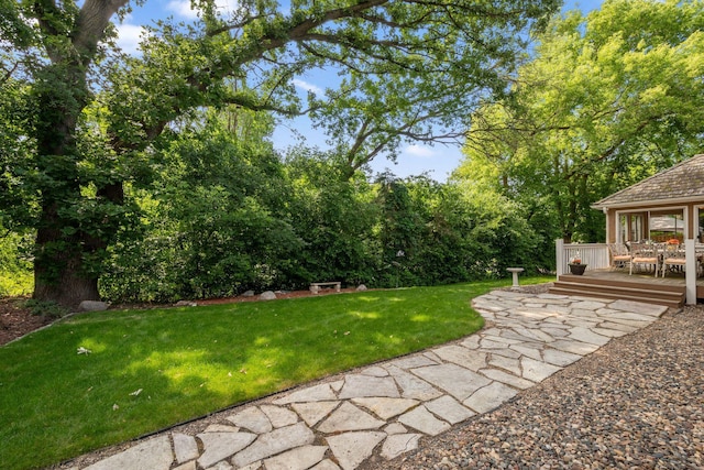 16209 Adeline Ln, Minnetonka, MN 55391 - view of green lawn with a deck and outdoor dining area