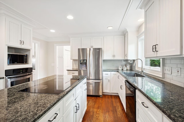 16209 Adeline Ln, Minnetonka, MN 55391 - kitchen featuring black appliances, white cabinets, dark wood finished floors, backsplash, and crown molding