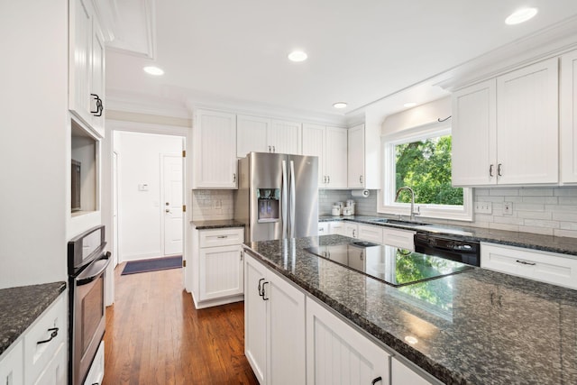 16209 Adeline Ln, Minnetonka, MN 55391 - kitchen with black appliances, white cabinetry, decorative backsplash, dark wood finished floors, and recessed lighting