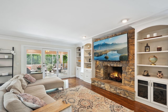 16209 Adeline Ln, Minnetonka, MN 55391 - living room with french doors, a fireplace, ornamental molding, wood finished floors, and built in shelves