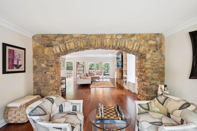 16209 Adeline Ln, Minnetonka, MN 55391 - living area featuring arched walkways, dark wood-type flooring, ornamental molding, and decorative columns