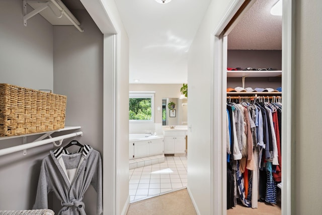16209 Adeline Ln, Minnetonka, MN 55391 - walk in closet with tile patterned flooring and carpet flooring