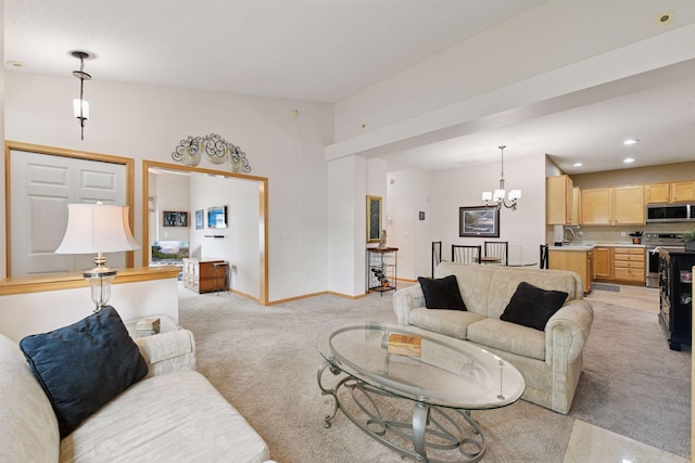 2014 Stahlke Way, Chaska, MN 55318 - living area featuring light colored carpet, a chandelier, and recessed lighting