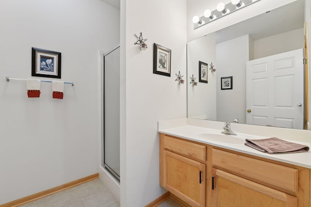 2014 Stahlke Way, Chaska, MN 55318 - bathroom featuring vanity, tile patterned flooring, and a shower with shower door