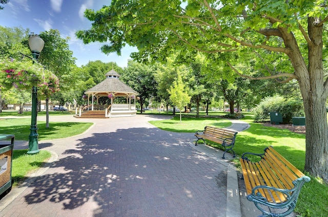 2014 Stahlke Way, Chaska, MN 55318 - view of property's community with a gazebo, a lawn, and view of wooded area