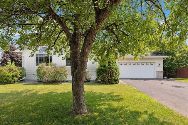 382 Tuttle Dr, Hastings, MN 55033 - view of front of home with driveway, a front yard, and a garage