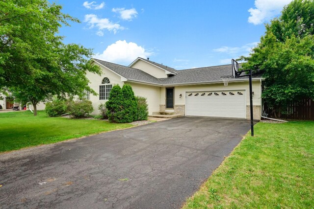 382 Tuttle Dr, Hastings, MN 55033 - ranch-style house with driveway, an attached garage, a front yard, and roof with shingles