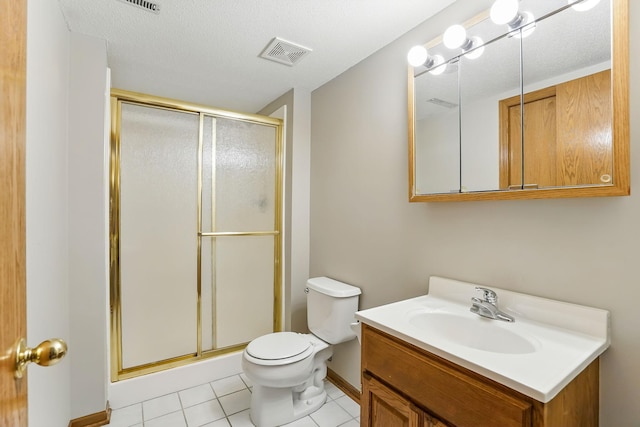 382 Tuttle Dr, Hastings, MN 55033 - bathroom with vanity, a stall shower, tile patterned floors, and a textured ceiling