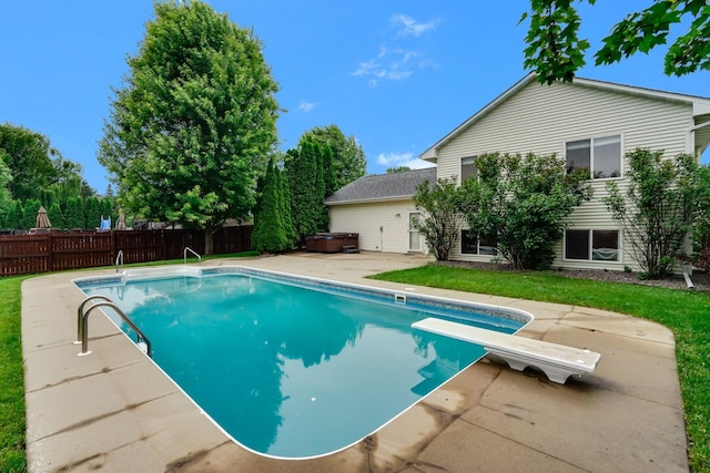 382 Tuttle Dr, Hastings, MN 55033 - view of swimming pool with a hot tub, a patio, and a diving board