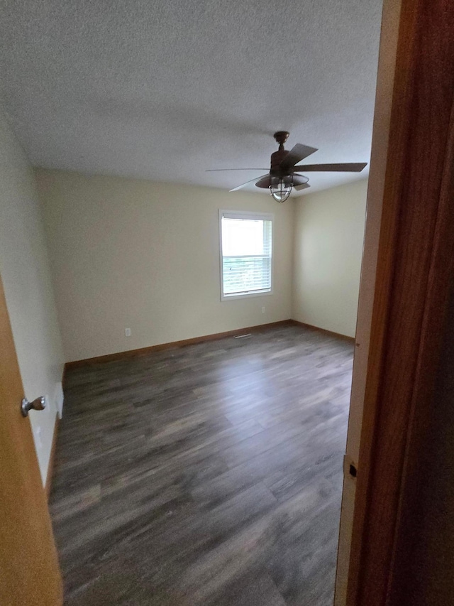 27891 Jerboa Ln, Cold Spring, MN 56320 - empty room featuring a ceiling fan, a textured ceiling, and wood finished floors