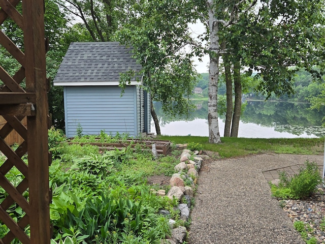 27891 Jerboa Ln, Cold Spring, MN 56320 - view of yard featuring a storage shed and a water view