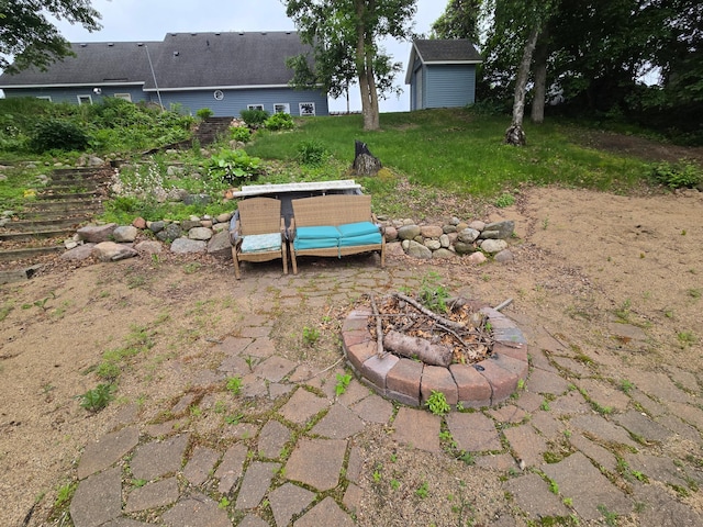 27891 Jerboa Ln, Cold Spring, MN 56320 - view of yard featuring an outdoor fire pit and an outbuilding
