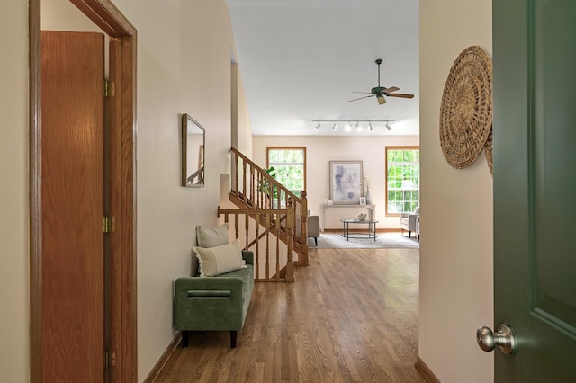 17121 Variolite St NW, Ramsey, MN 55303 - hallway with wood finished floors and stairs