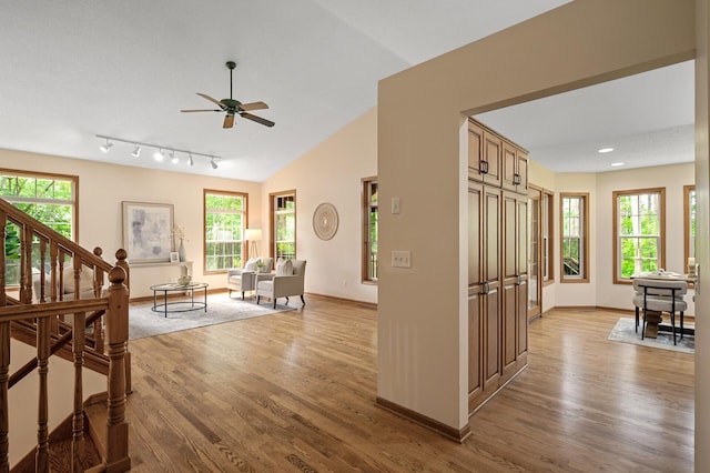 17121 Variolite St NW, Ramsey, MN 55303 - living room featuring light wood-style floors, a ceiling fan, stairway, lofted ceiling, and recessed lighting