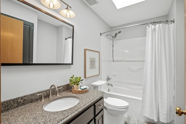 17121 Variolite St NW, Ramsey, MN 55303 - bathroom with vanity, shower / bathtub combination with curtain, and a skylight