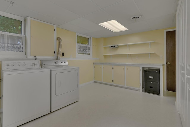 808 17th St SW, Willmar, MN 56201 - laundry room with washing machine and clothes dryer and baseboards