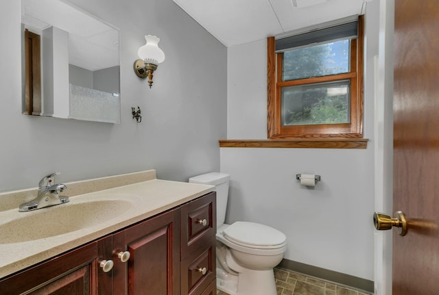808 17th St SW, Willmar, MN 56201 - bathroom featuring toilet and vanity