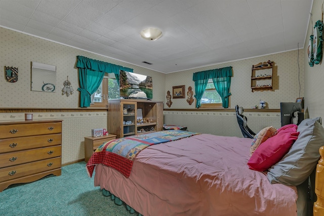 808 17th St SW, Willmar, MN 56201 - bedroom with wallpapered walls, ornamental molding, and carpet floors