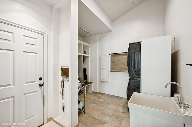 820 Vineland Ct, Chanhassen, MN 55317 - laundry area with stacked washer / drying machine and baseboards