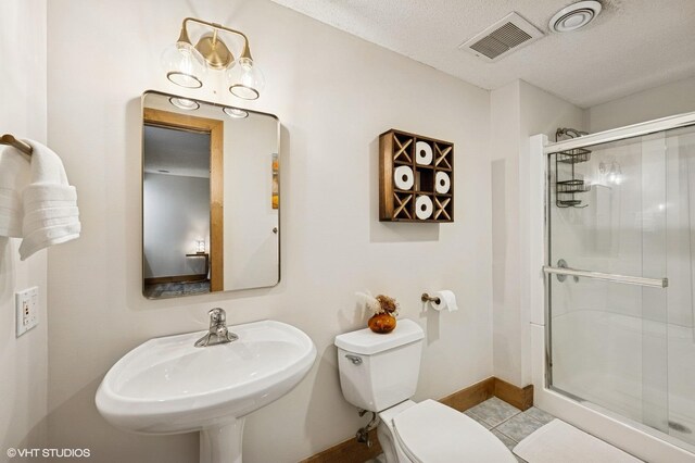 820 Vineland Ct, Chanhassen, MN 55317 - full bath featuring a stall shower, a textured ceiling, and tile patterned floors