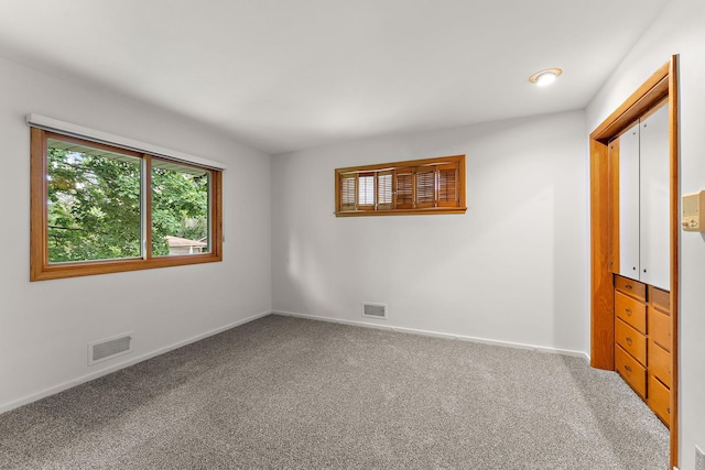 354 Edith Dr W, Saint Paul, MN 55118 - carpeted spare room featuring baseboards
