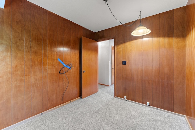 354 Edith Dr W, Saint Paul, MN 55118 - spare room with carpet and wood walls