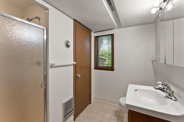 354 Edith Dr W, Saint Paul, MN 55118 - bathroom with a shower stall, vanity, tile patterned floors, and heating unit