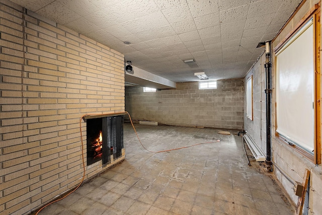 354 Edith Dr W, Saint Paul, MN 55118 - below grade area with a brick fireplace and concrete block wall