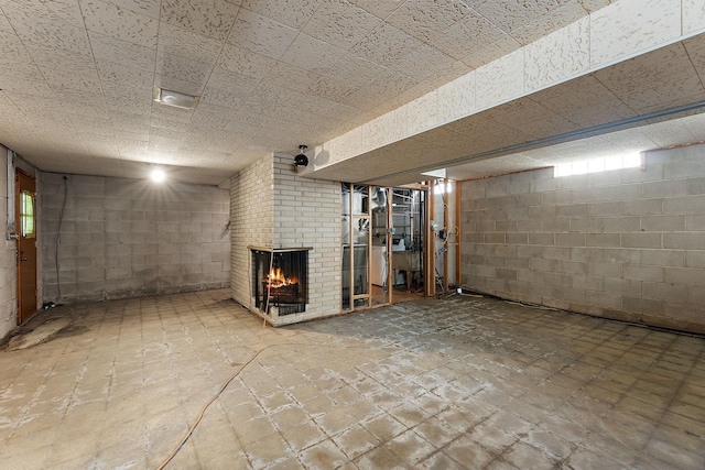 354 Edith Dr W, Saint Paul, MN 55118 - below grade area with a fireplace and concrete block wall