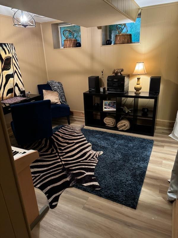 1439 7th St SW, New Brighton, MN 55112 - living area featuring wood finished floors and baseboards
