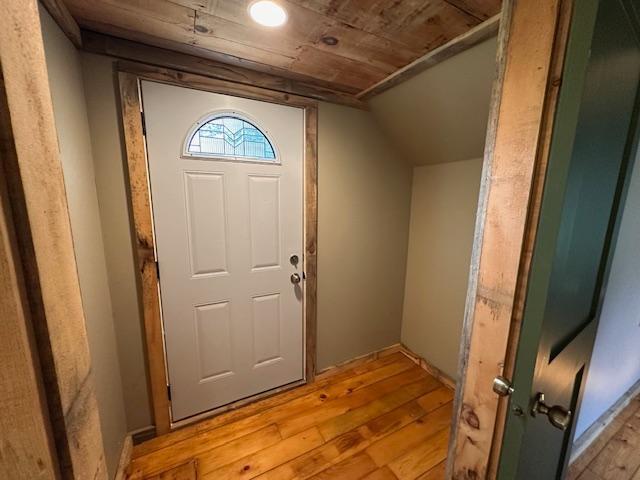4623 Salo Rd, Waasa Twp, MN 55732 - foyer entrance with light wood-style flooring, lofted ceiling, and wood ceiling