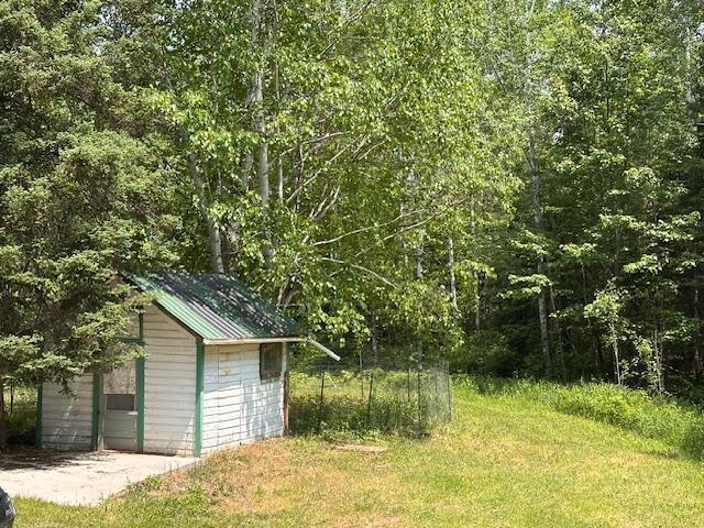 4623 Salo Rd, Waasa Twp, MN 55732 - view of yard with an outbuilding and a view of trees
