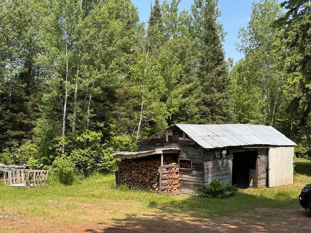 4623 Salo Rd, Waasa Twp, MN 55732 - view of outbuilding with a wooded view