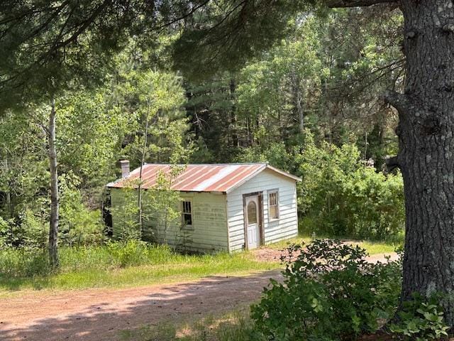 4623 Salo Rd, Waasa Twp, MN 55732 - view of outbuilding featuring a wooded view and driveway